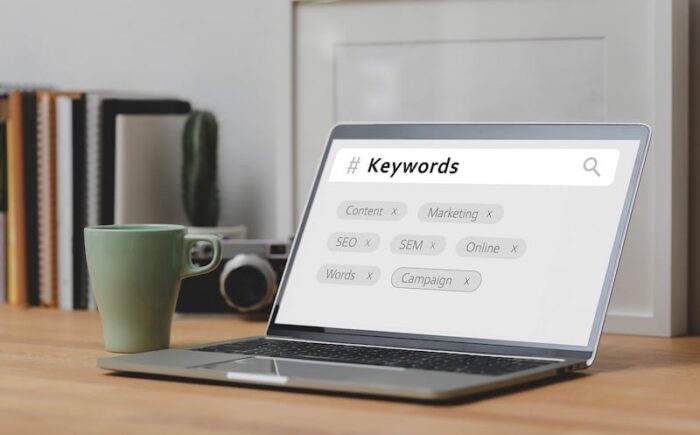 a laptop that shows a page with keywords so you can advertise on google
