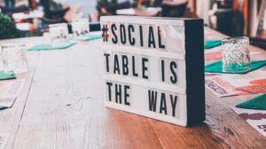 A sign on a table affirming the importance of viral marketing